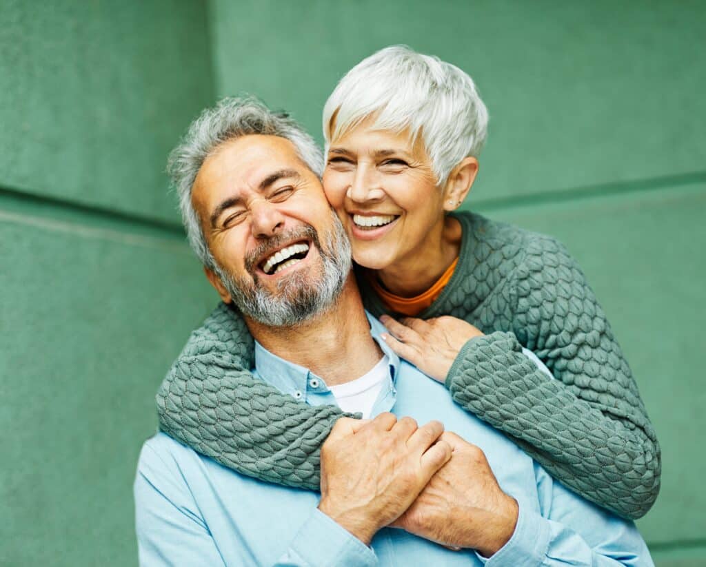 Happy,Active,Senior,Couple,Having,Fun,Outdoors