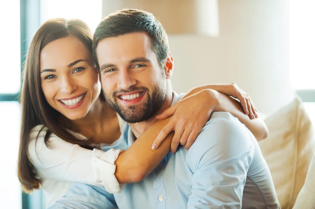 Enjoying,Every,Minute,Together.,Beautiful,Young,Loving,Couple,Sitting,Together